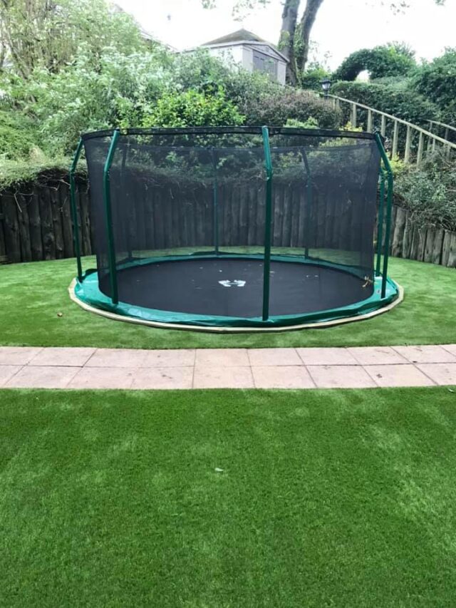 artificial grass back garden with trampoline in Peterhead